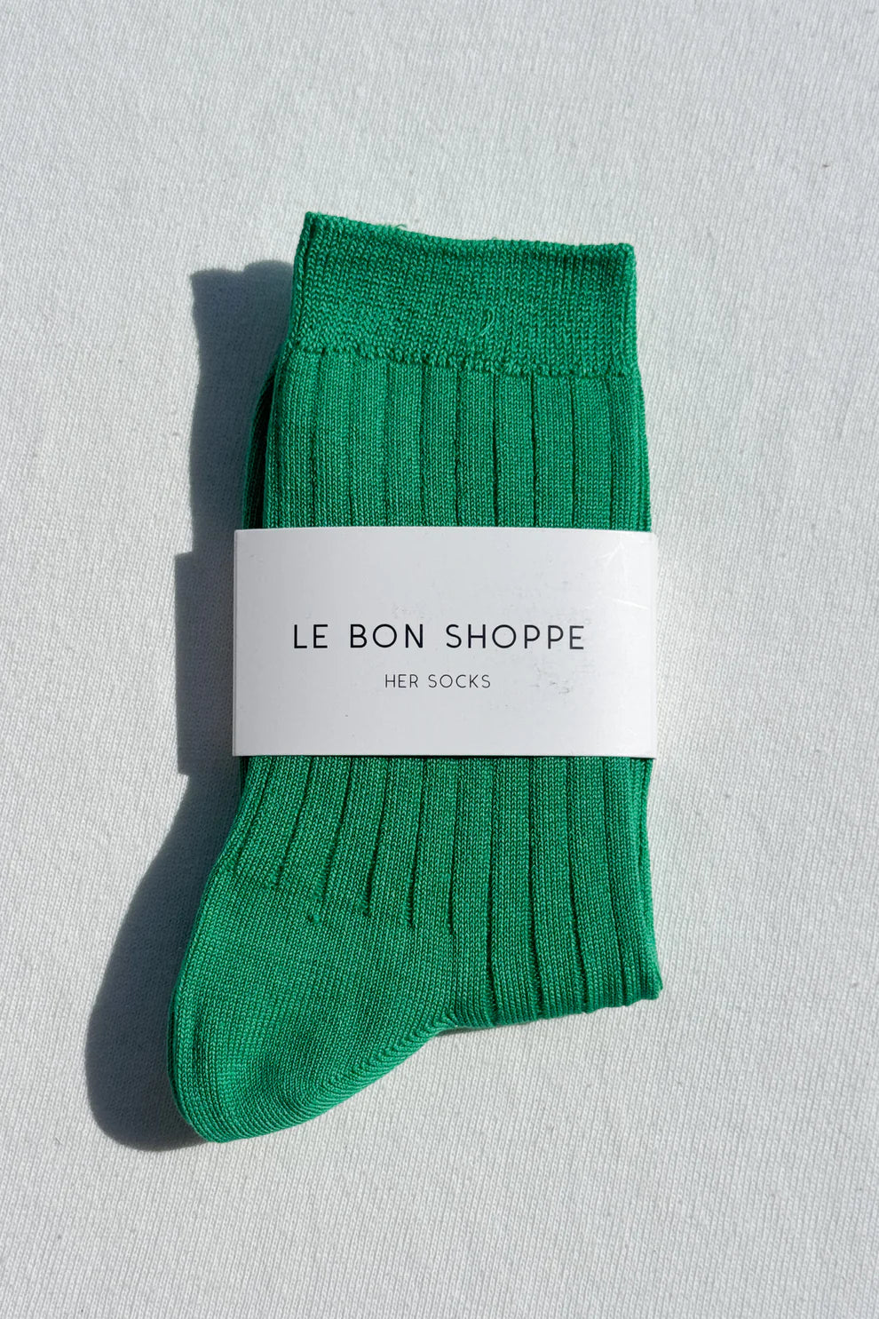 Her kelly green socks 