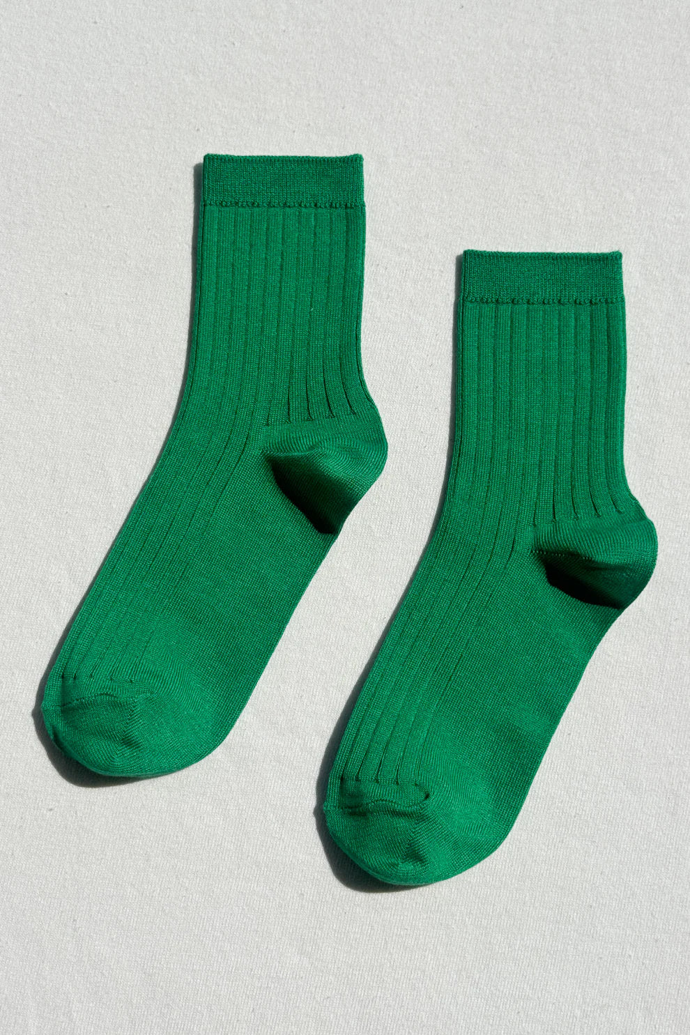 Her kelly green socks 